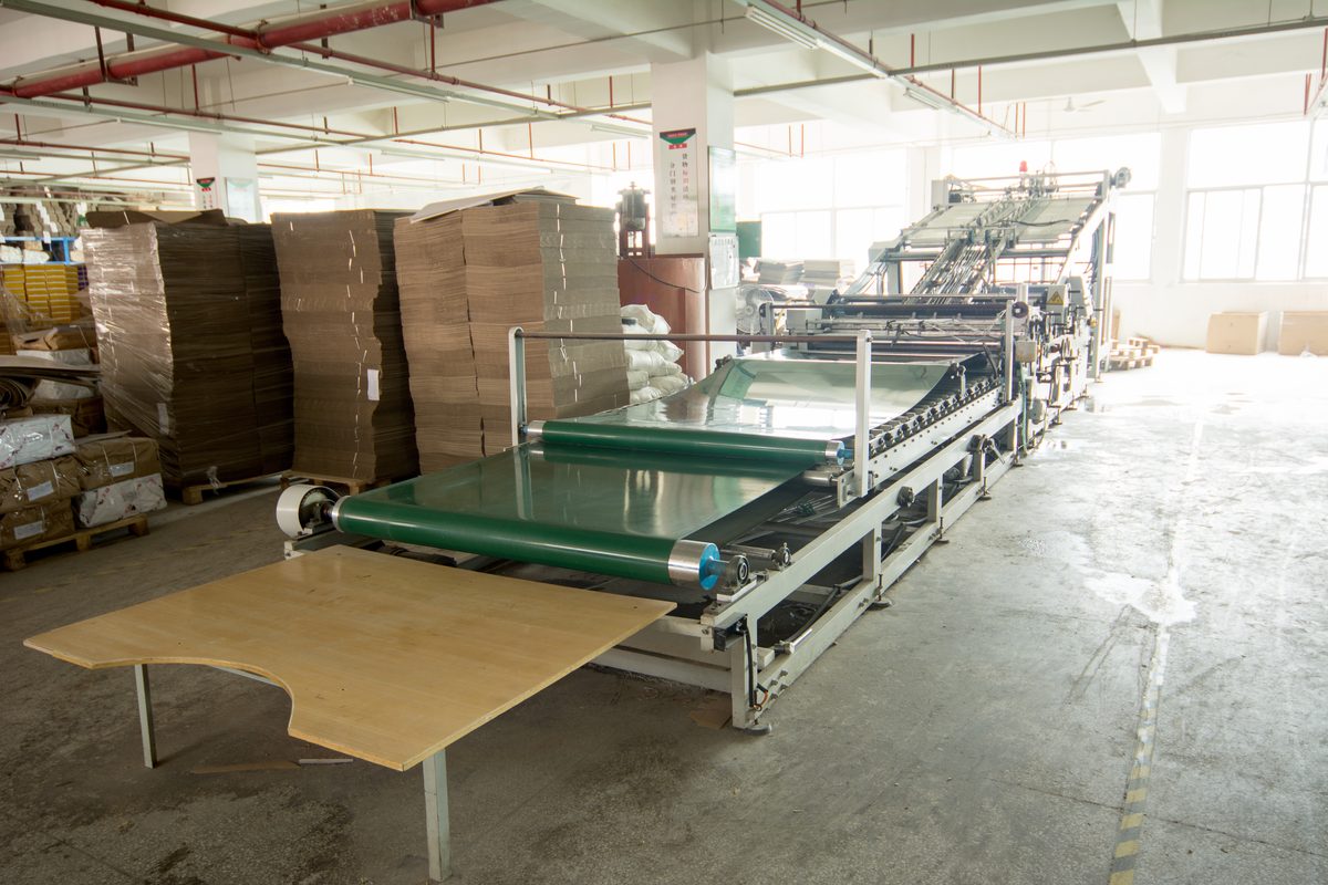 Automatic box gluing and folding production line