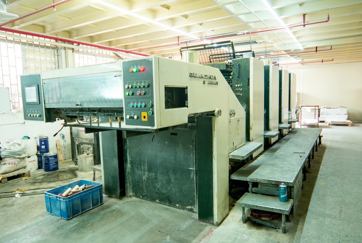 Offset printing press at Genesis Bags factory