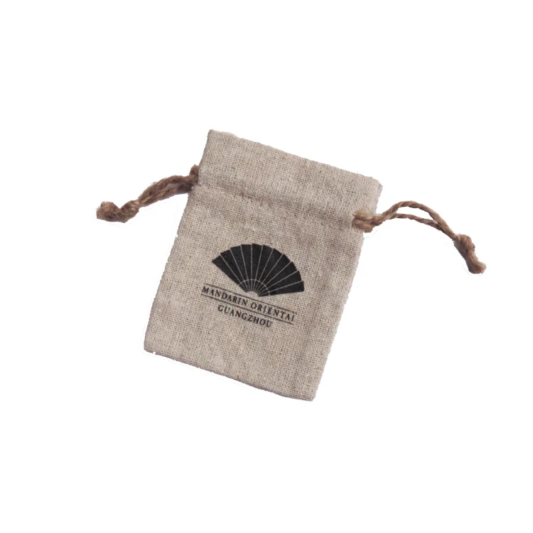 White linen drawstring pouch with heart applique