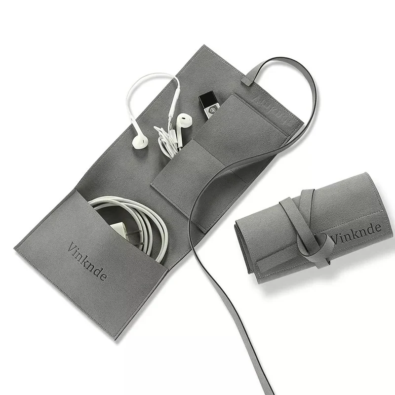 Gray microfiber cable and tech accessory organizer roll with wrap-tie closure