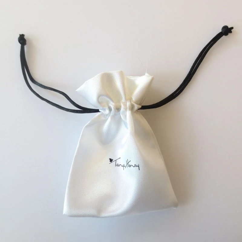 White satin drawstring pouch with custom brand print